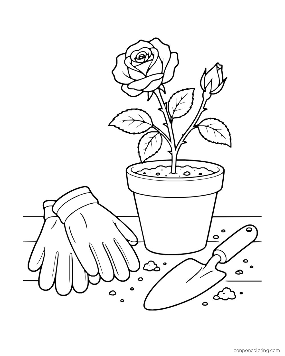 Potted rose cutting beside gardening gloves and a hand trowel on a potting surface.