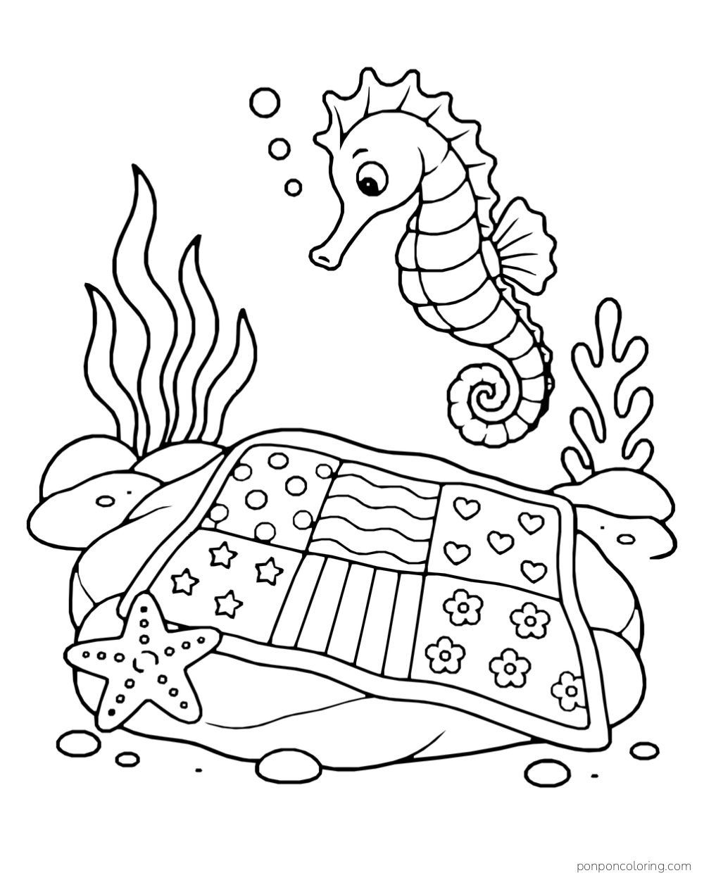 A seahorse above a patchwork quilt spread over a rock, with a starfish beside one corner.