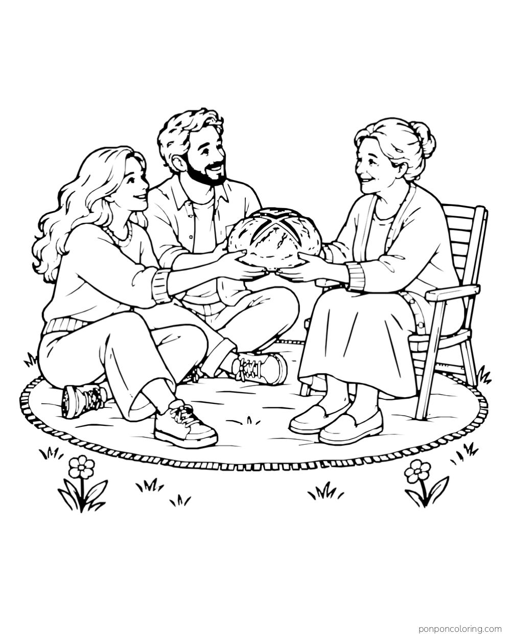 Three adults seated together outdoors hold a large scored loaf above a small round rug.