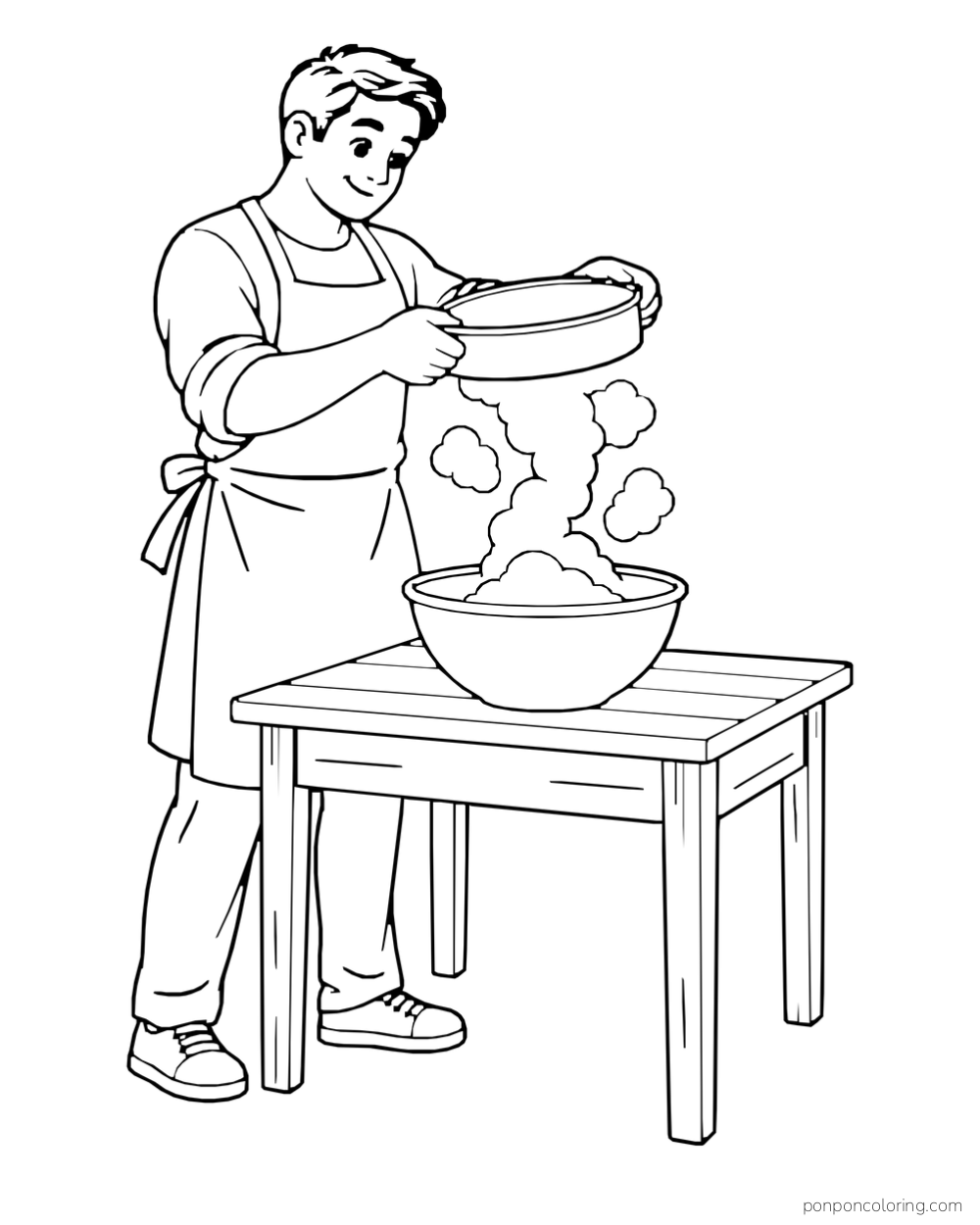 An adult baker holds a sieve over a bowl on a sturdy table as flour falls through.