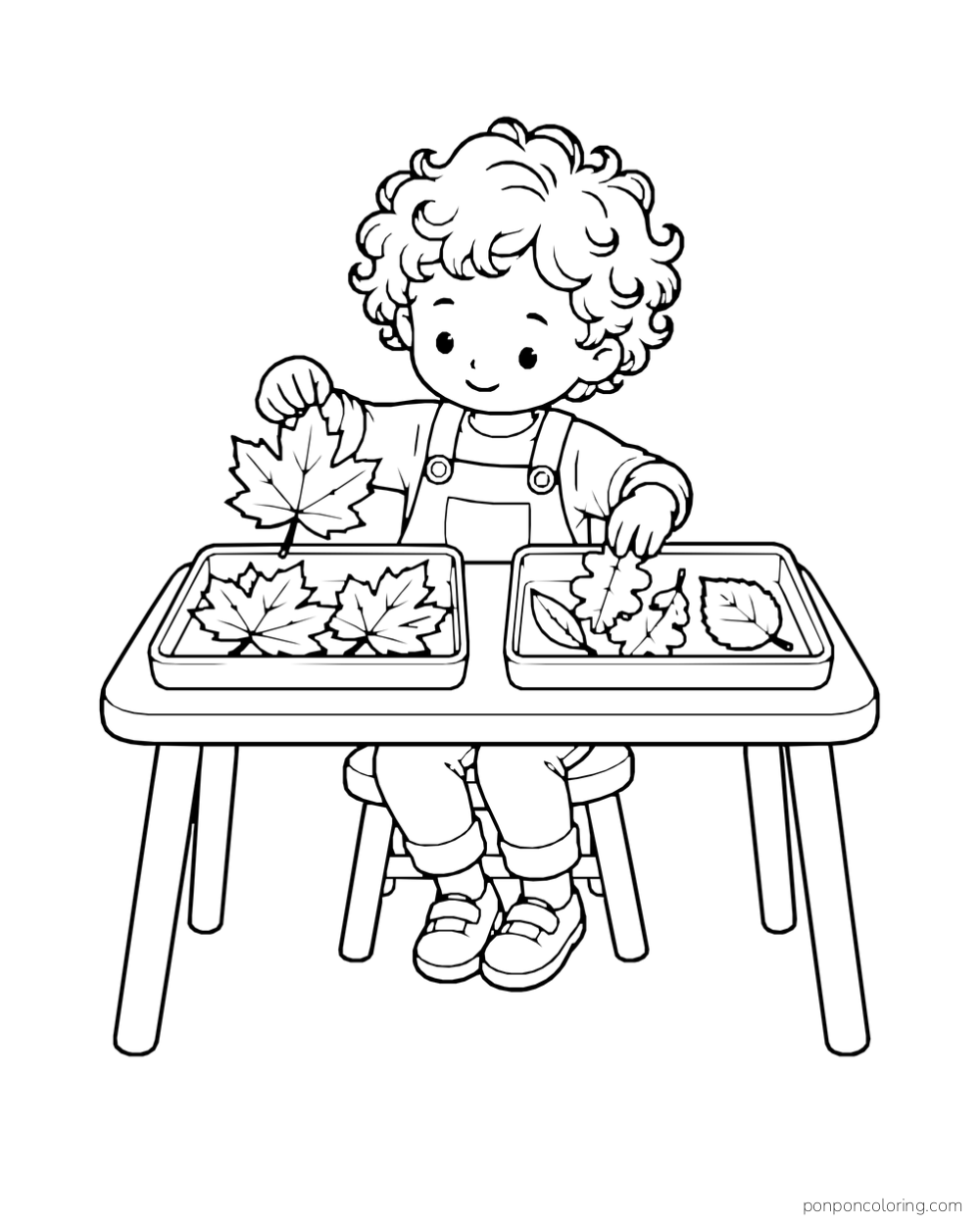 A curly-haired child in overalls sorts leaves into two trays at a low table.