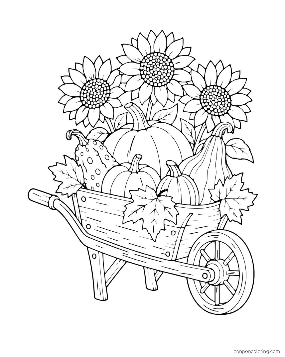 A wooden wheelbarrow holds sunflowers, pumpkins, gourds, and broad fall leaves.