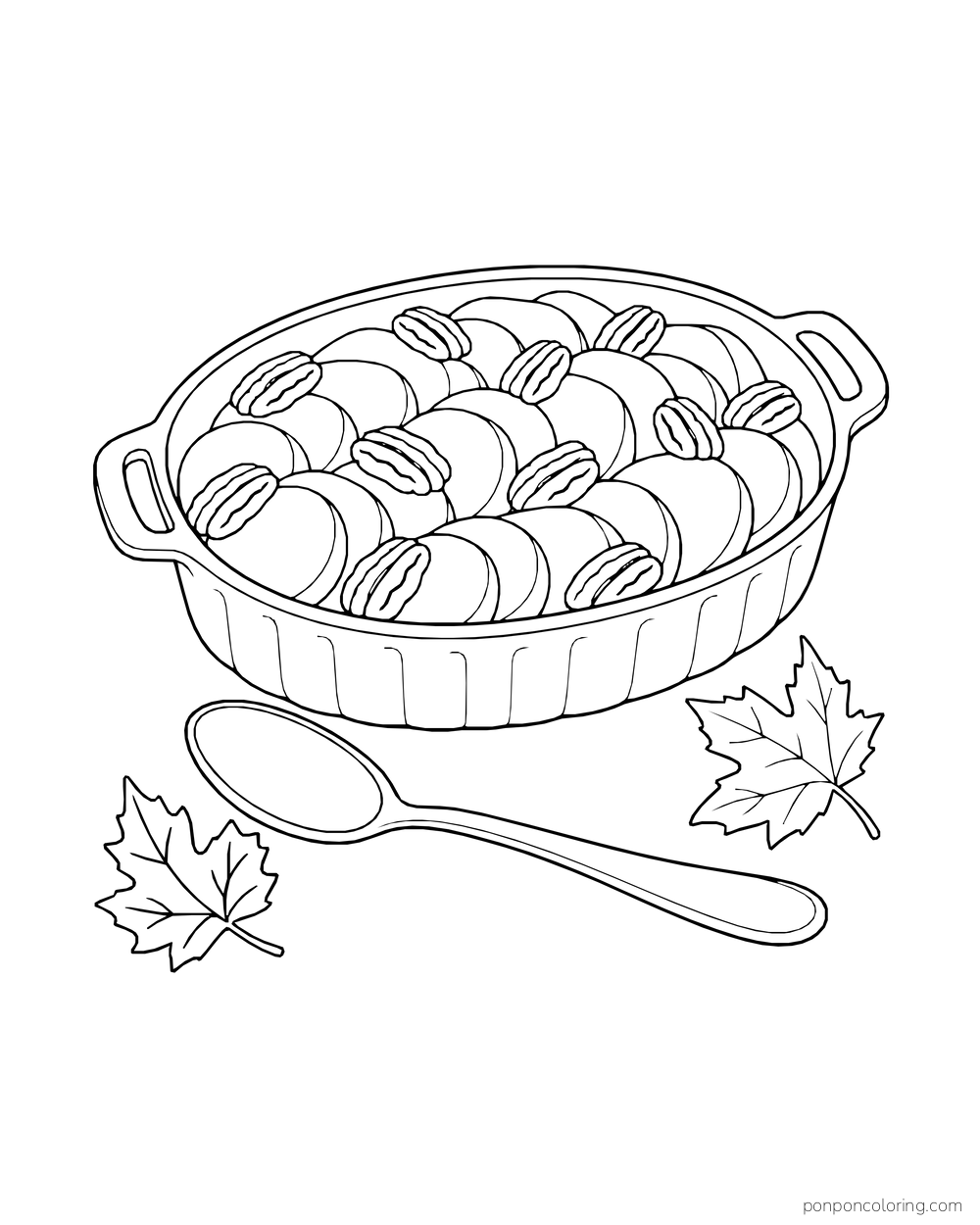 A casserole of sliced sweet potatoes and pecans sits beside a serving spoon and leaves.