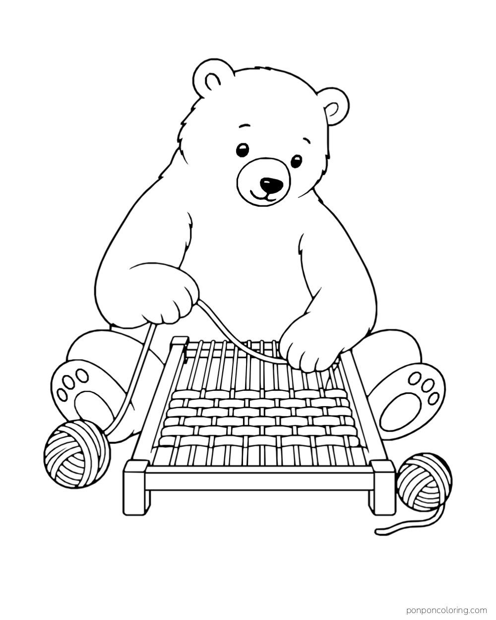 A polar bear weaves on a floor frame with two balls of yarn nearby.