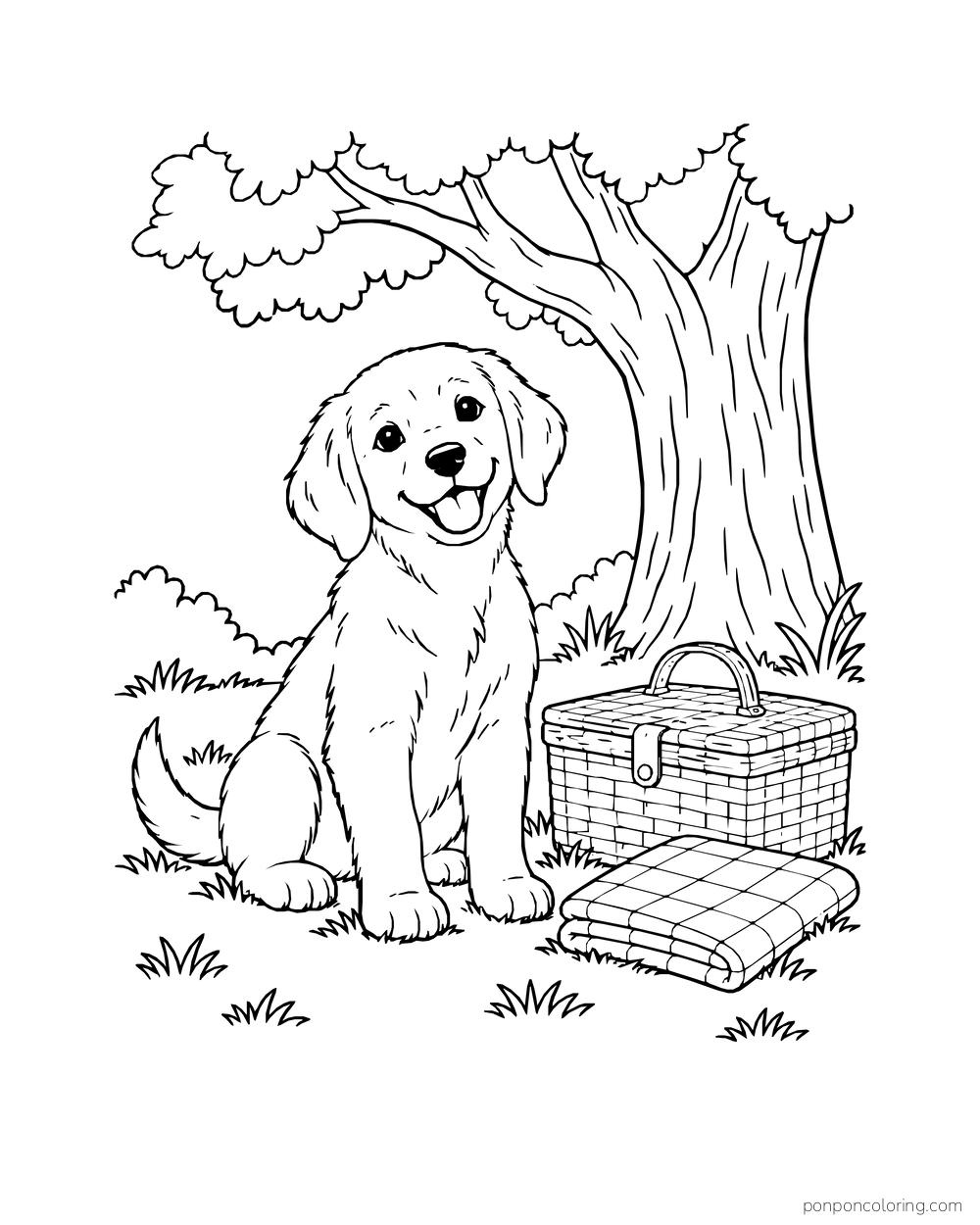 A puppy sits beside a closed picnic basket and folded cloth under a tree.