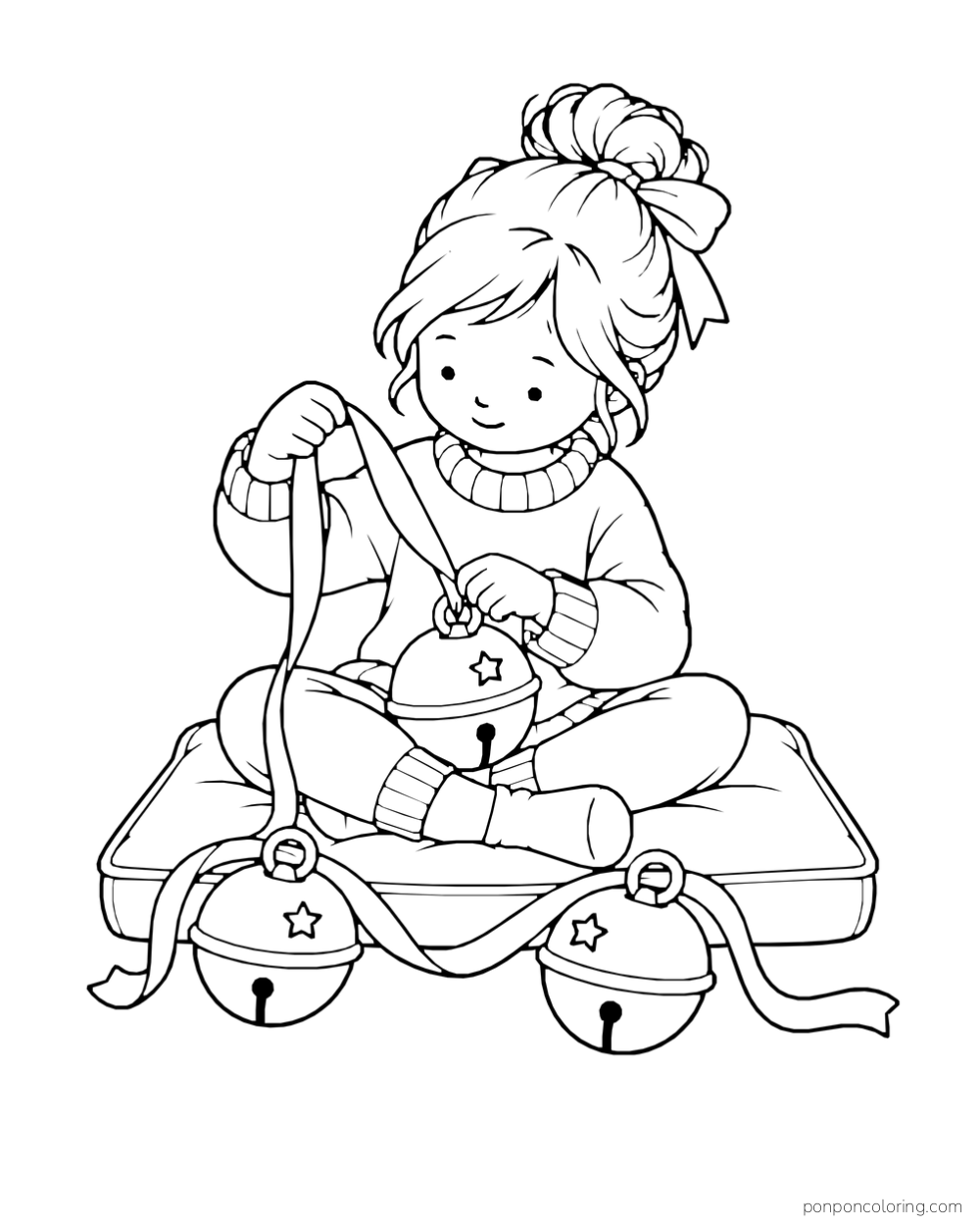 A child sits on a cushion threading ribbon through three large Christmas bells.