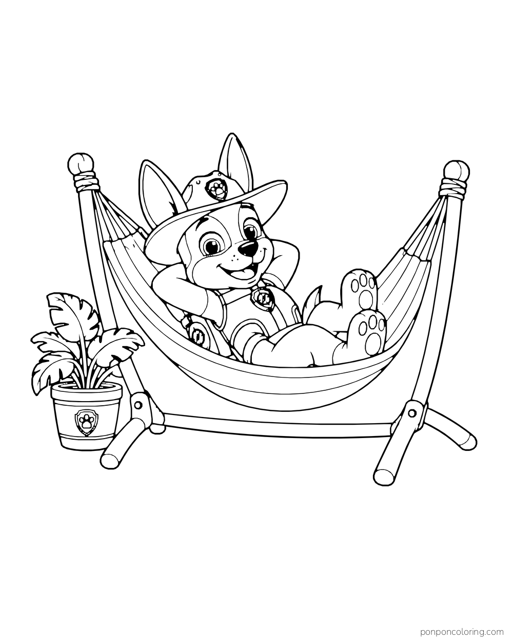 Tracker rests in a hammock on a freestanding frame beside a potted plant.