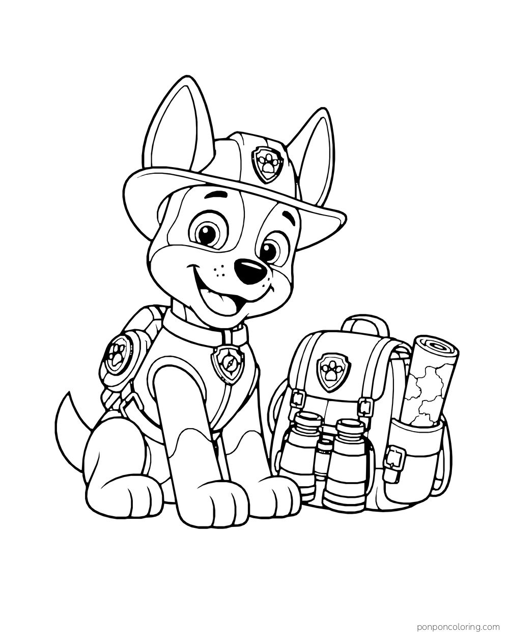 Tracker sits beside a backpack with binoculars and a rolled map.
