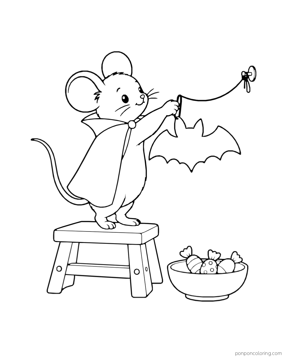 A caped mouse stands on a short step hanging a paper bat beside a small bowl of wrapped sweets.