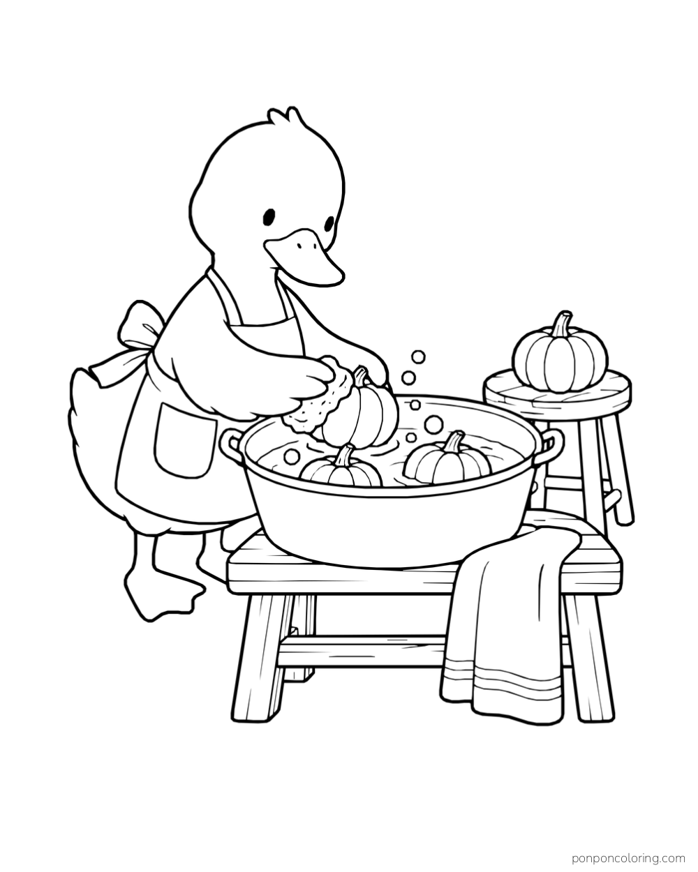 A duck washes pumpkins in a round basin on a bench beside a towel and a pumpkin on a stool.