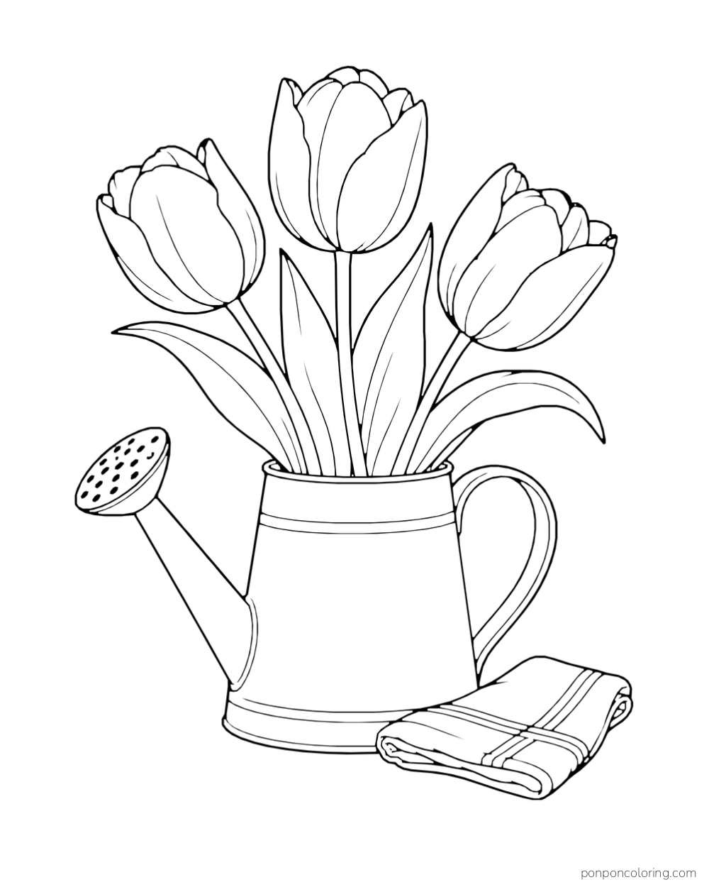 Three tulips standing in a watering can with a folded cloth beside it.