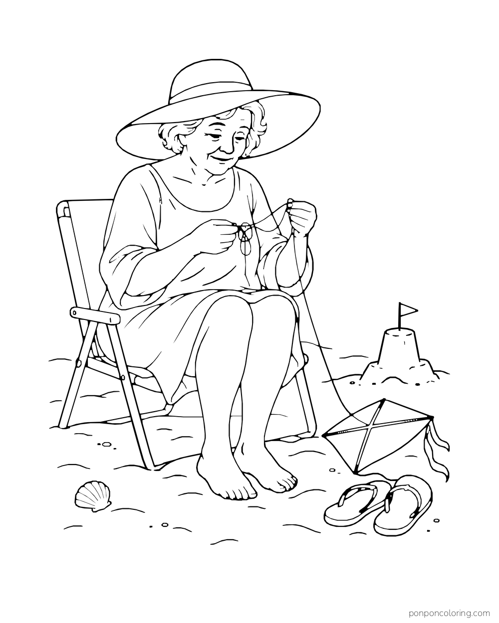 A woman sits by the beach and works a tangled kite string between her hands.