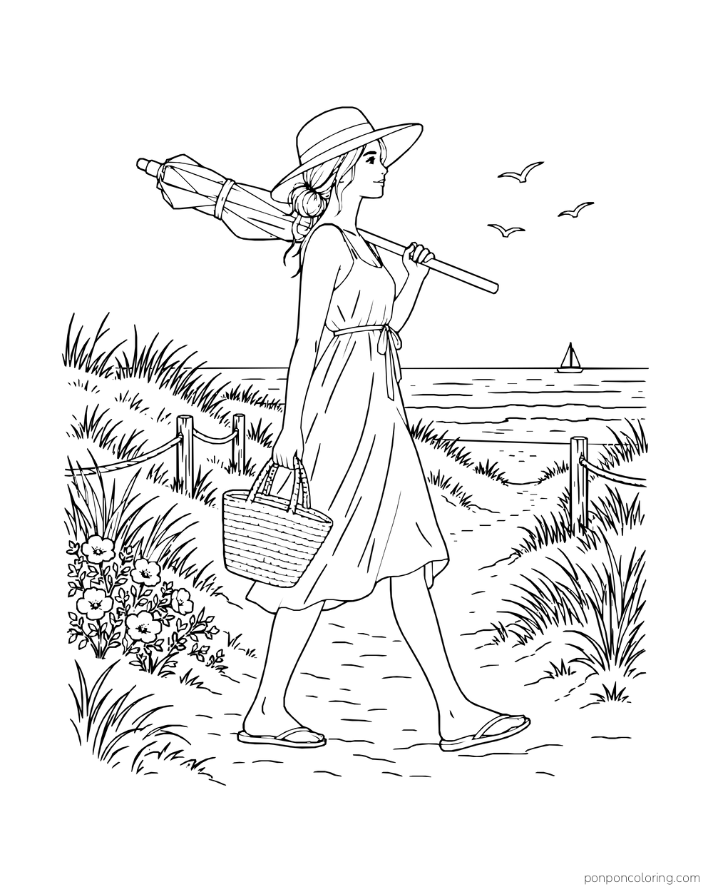 A woman carries a closed umbrella and woven tote along a grassy beach path.
