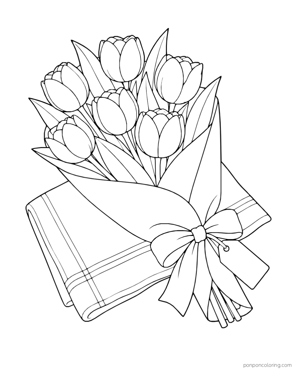 A bouquet of six tulips wrapped in paper and tied with a large bow and blank gift tag, resting on a folded striped cloth.