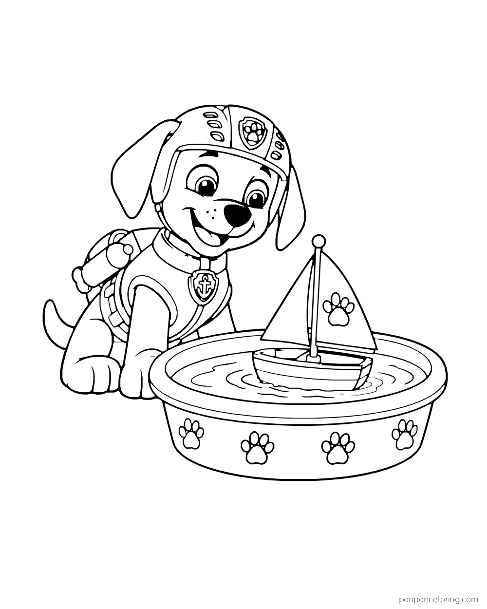 Zuma watches a toy sailboat floating in a small round tub decorated with paw prints.